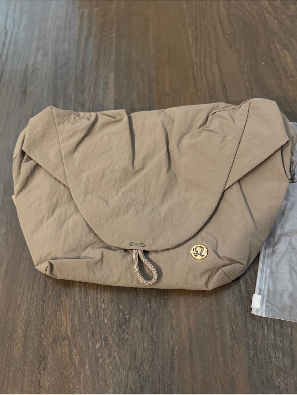 Lululemon curved crossbody bag grey color